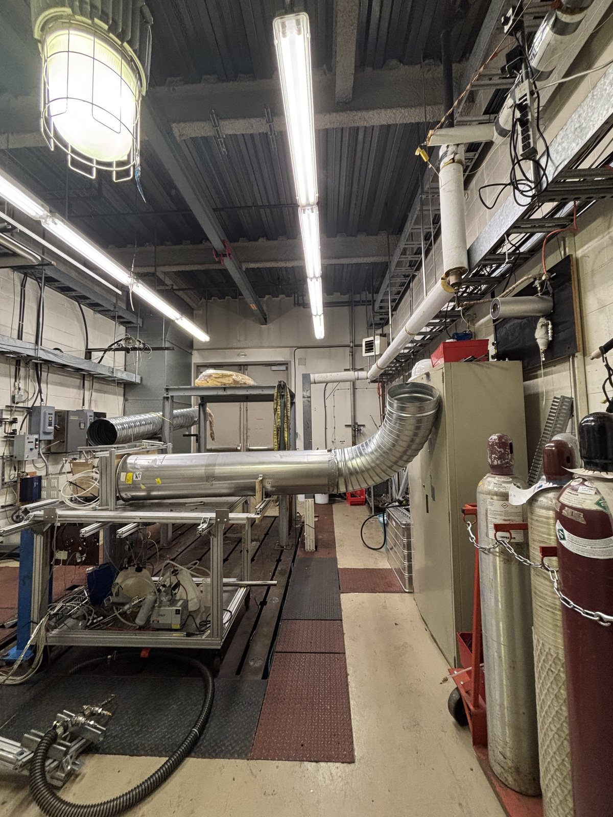 Newer setup work in the test cell: exploring layout options with the ducting and supplies we already have.